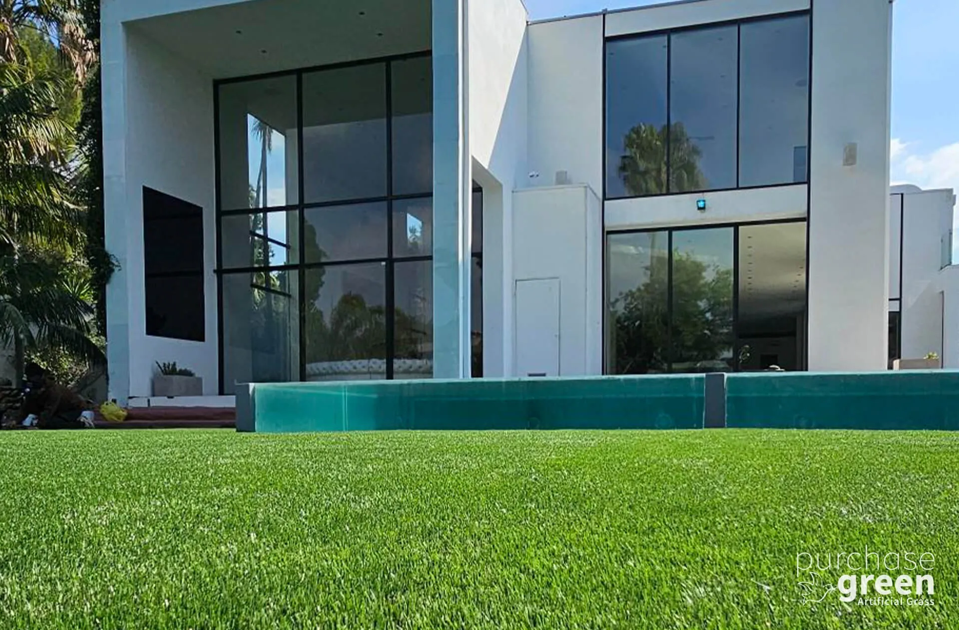 Bluegrass Light artificial turf installed in a yard, manufacturer photo 1