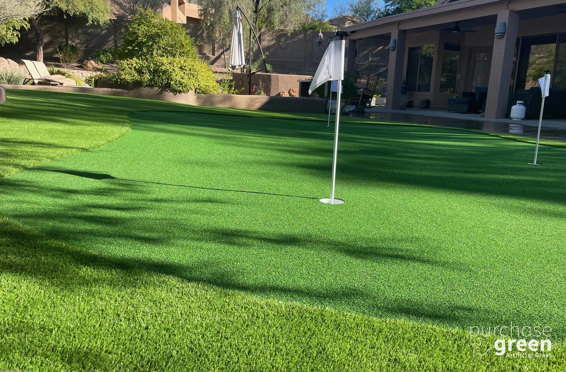 Ultra Play artificial turf installed in a yard, manufacturer photo 1