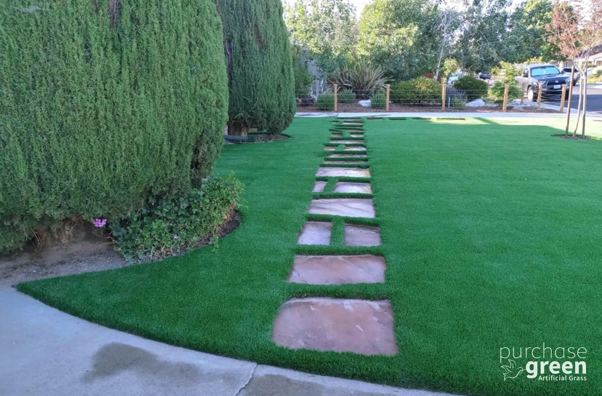 Bluegrass Supreme artificial turf installed in a yard, manufacturer photo 3