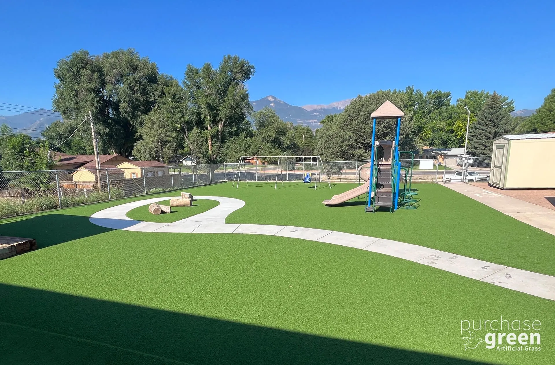 Playscape Premier 75 artificial turf installed in a yard, manufacturer photo 3