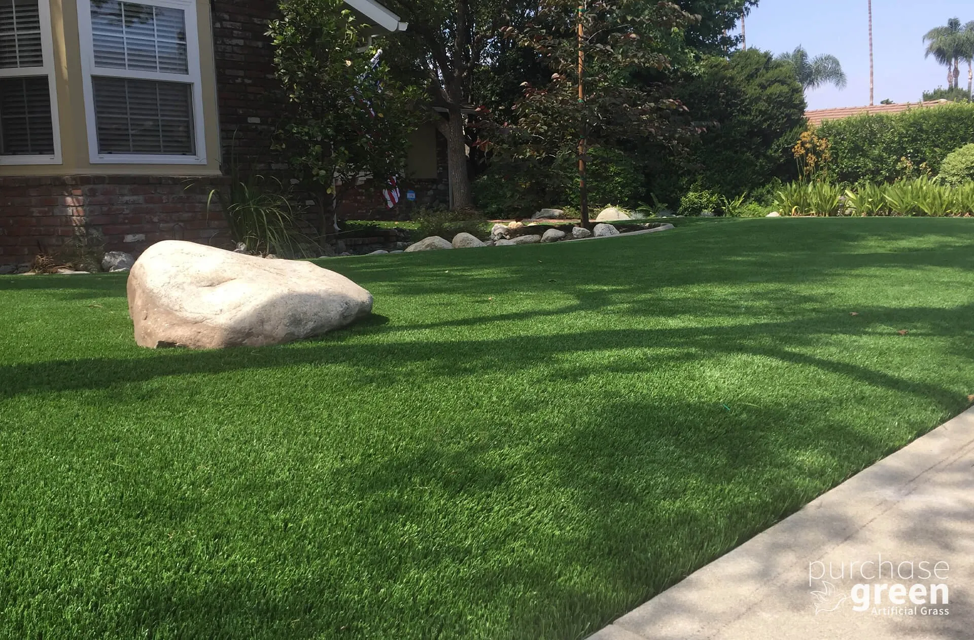 Bluegrass Supreme artificial turf installed in a yard, manufacturer photo 6