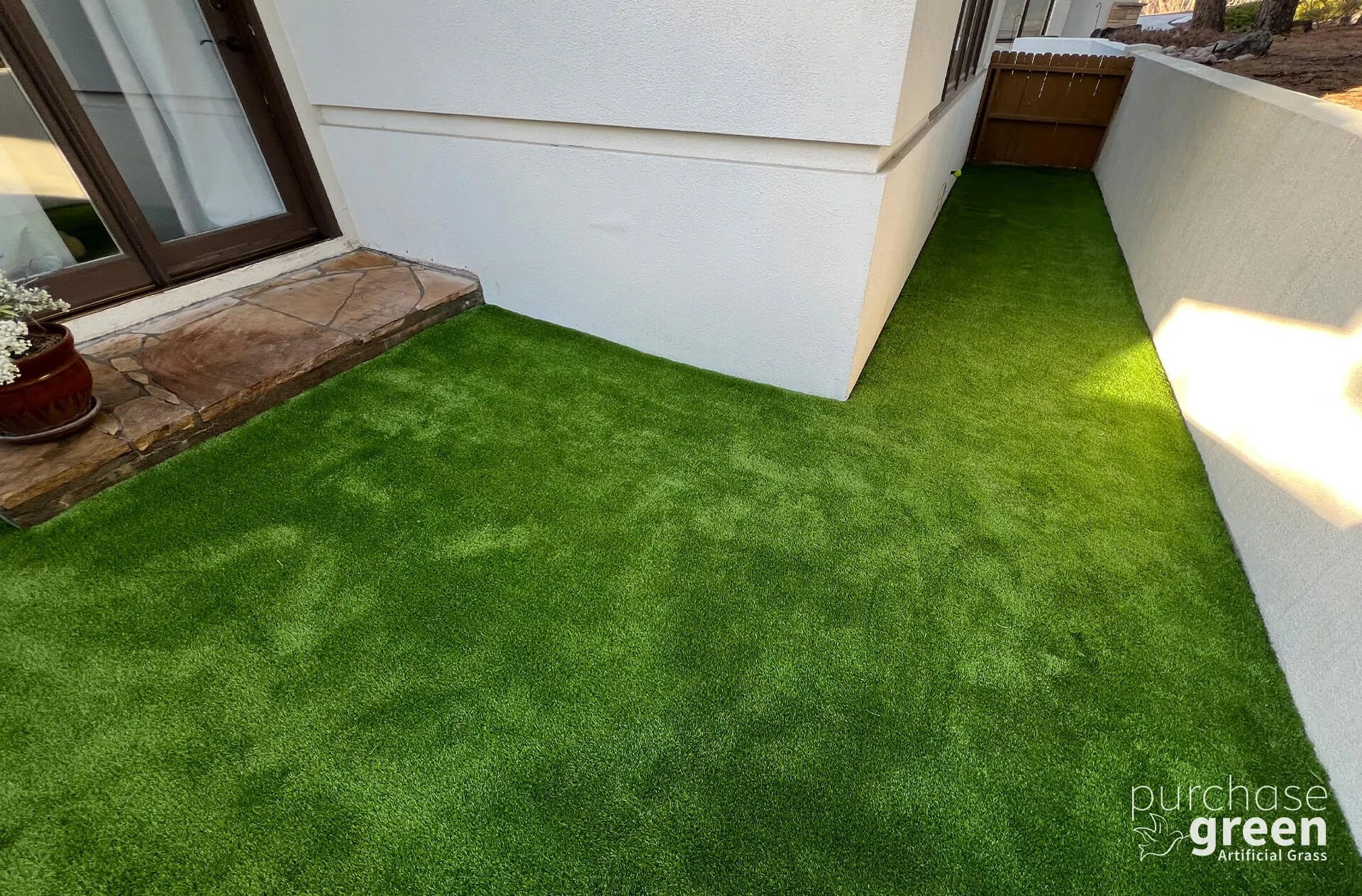 Ultra Play artificial turf installed in a yard, manufacturer photo 6