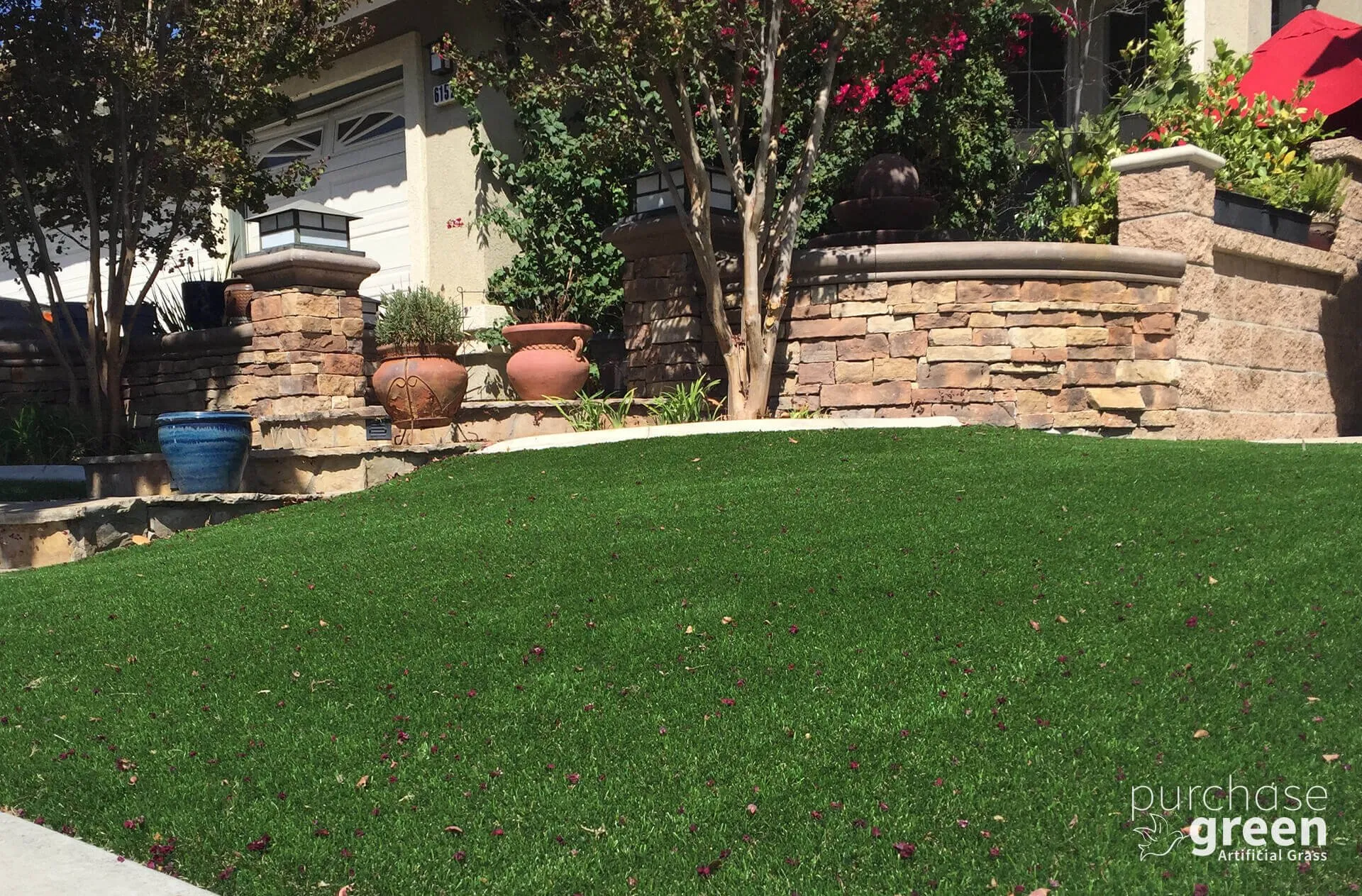 Bluegrass Light artificial turf installed in a yard, manufacturer photo 6